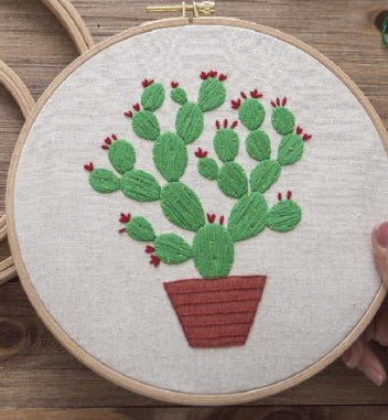 Cross stitch of green plants