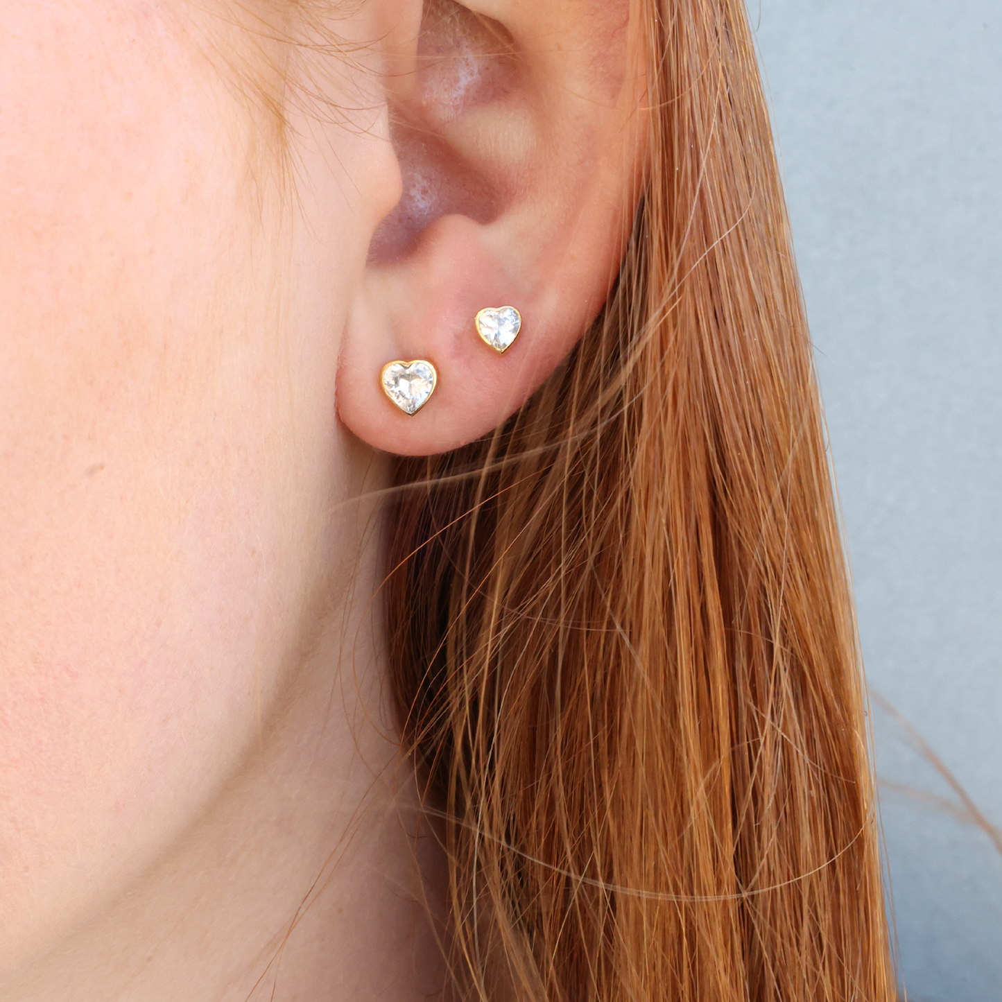 Sparkling Love Stud Earrings - Polished Gold Plated Sterling Silver with 2 white Cubic Zirkonia