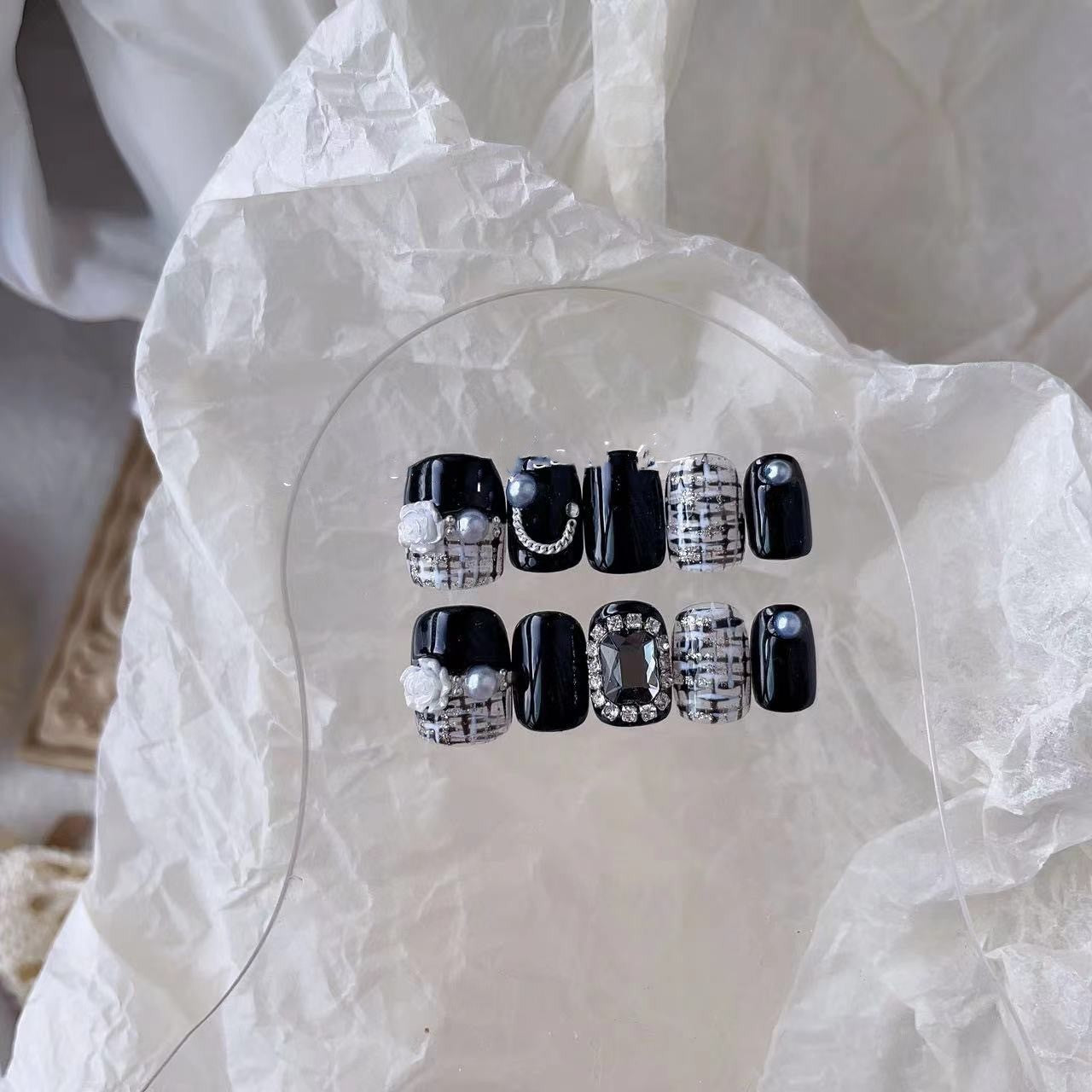 Perlenkette, Nagelflicken